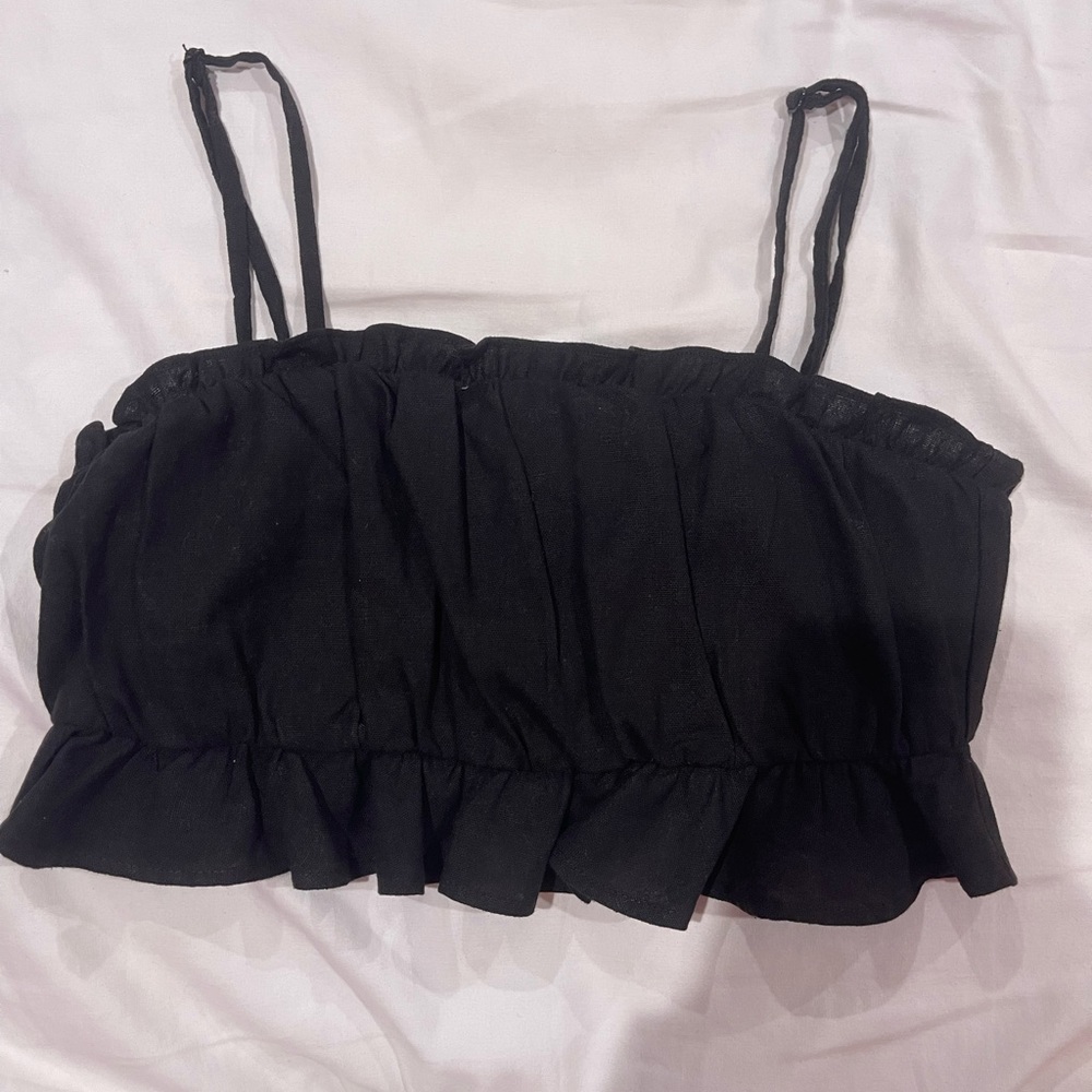 Black ruffle top